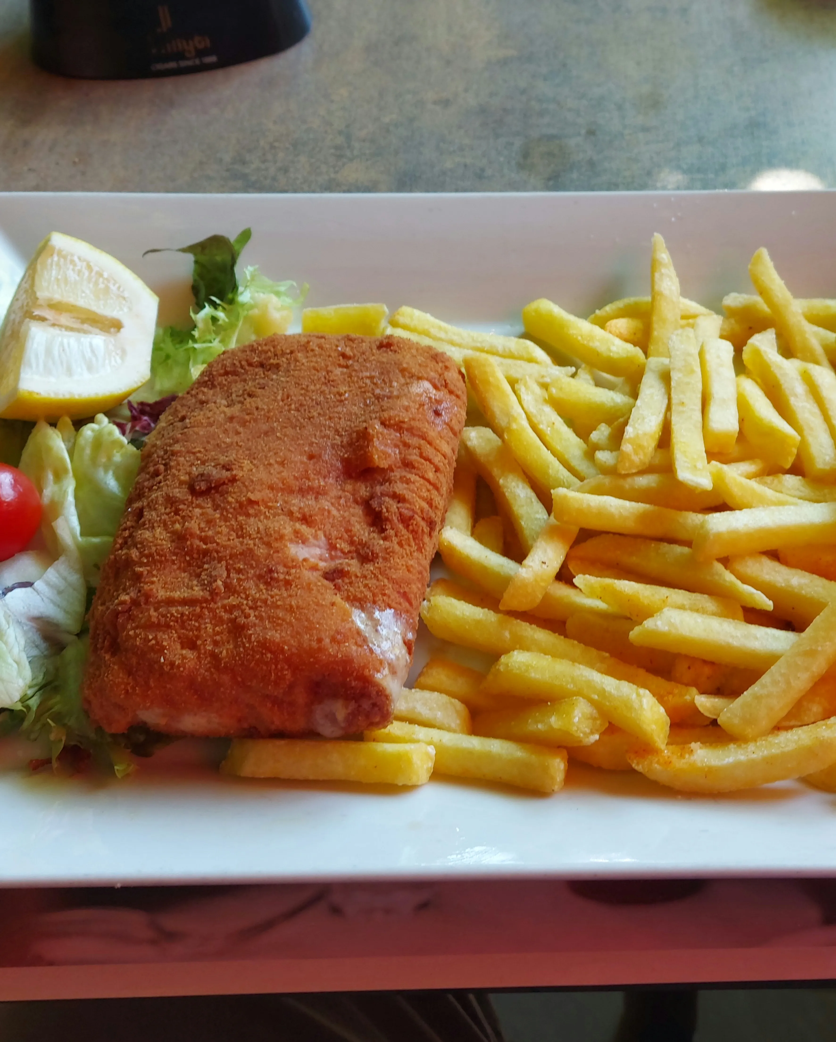 Cordon bleu with fries and vegetables at Trattoria Bella Italia