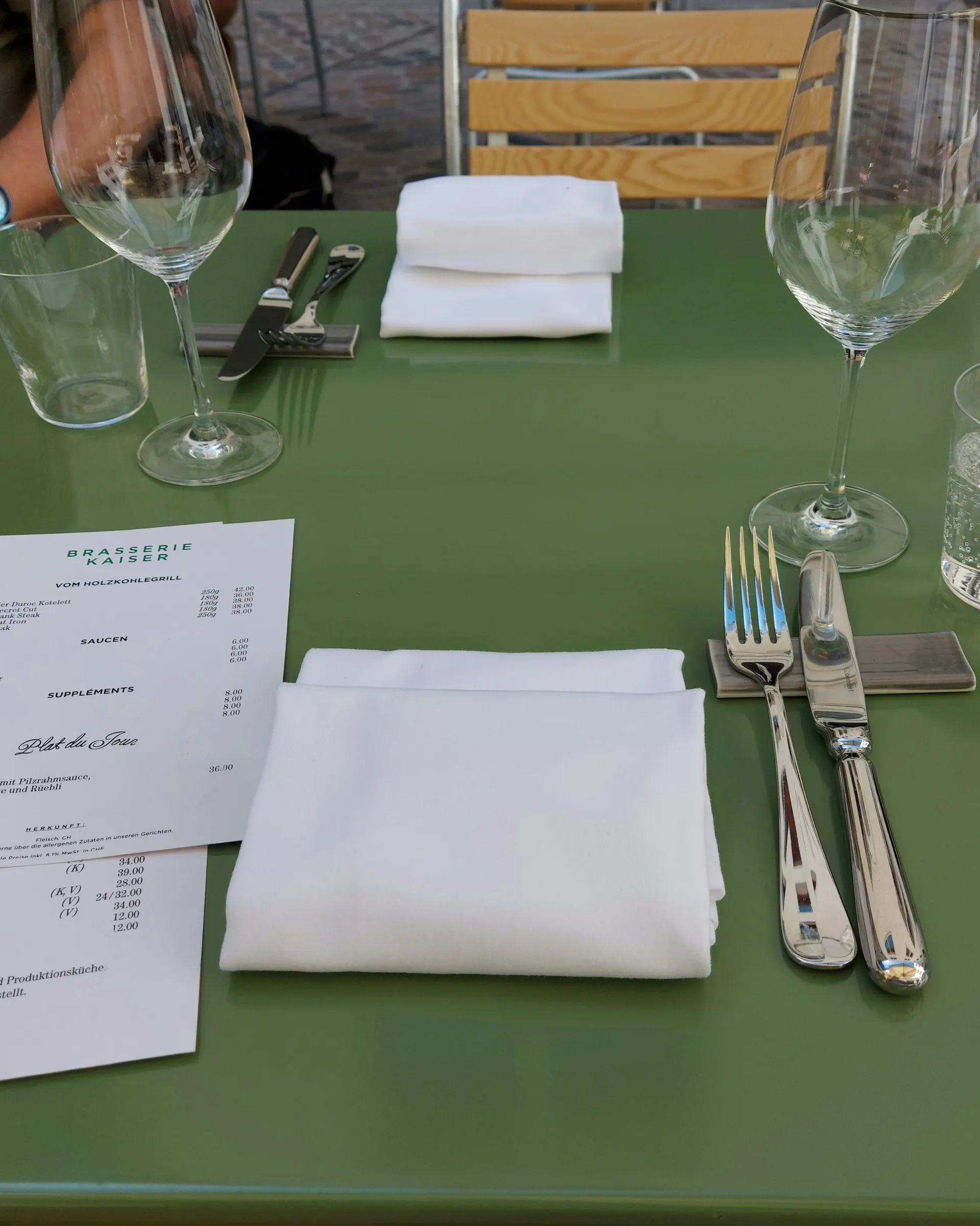 Set table at Brasserie Kaiser with white napkin