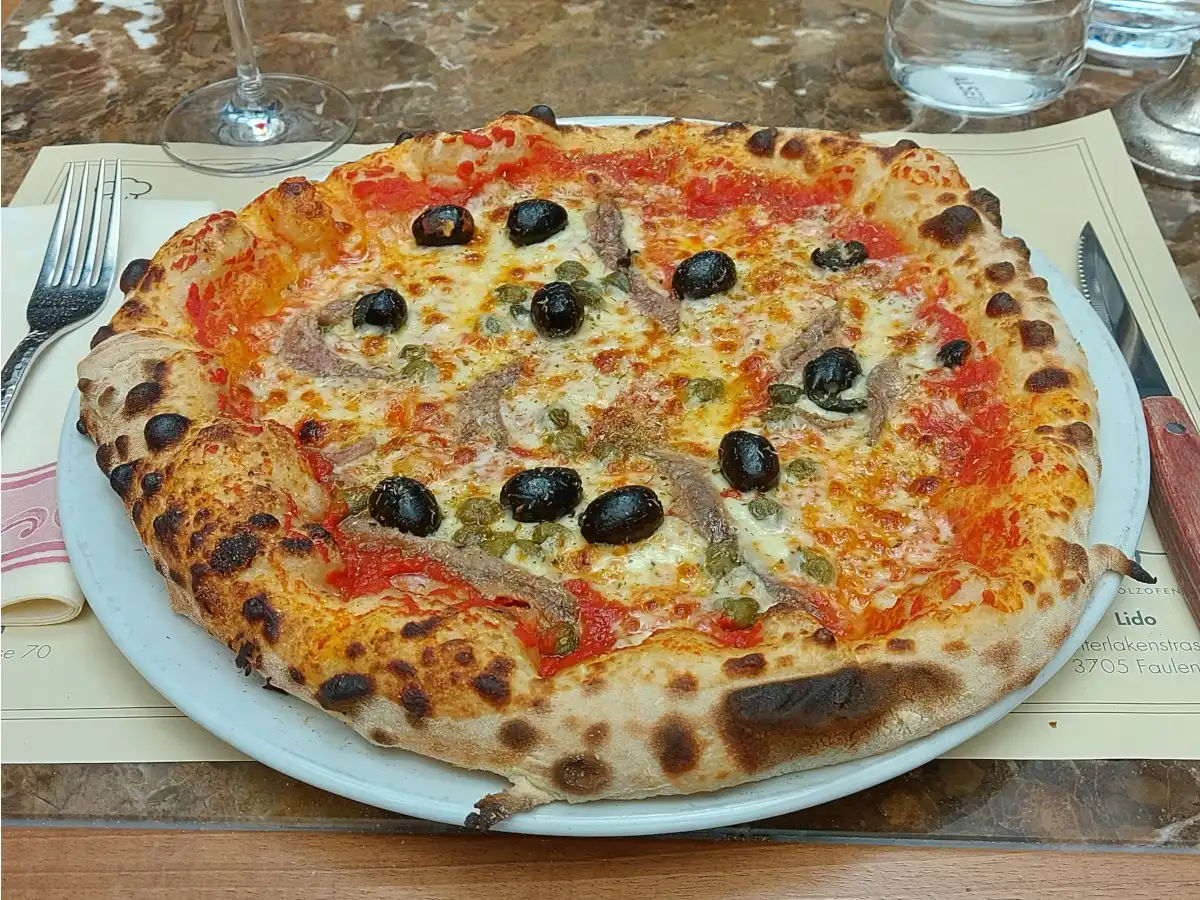 Authentic Pizza Napoli from the pizza oven at Celina Bern