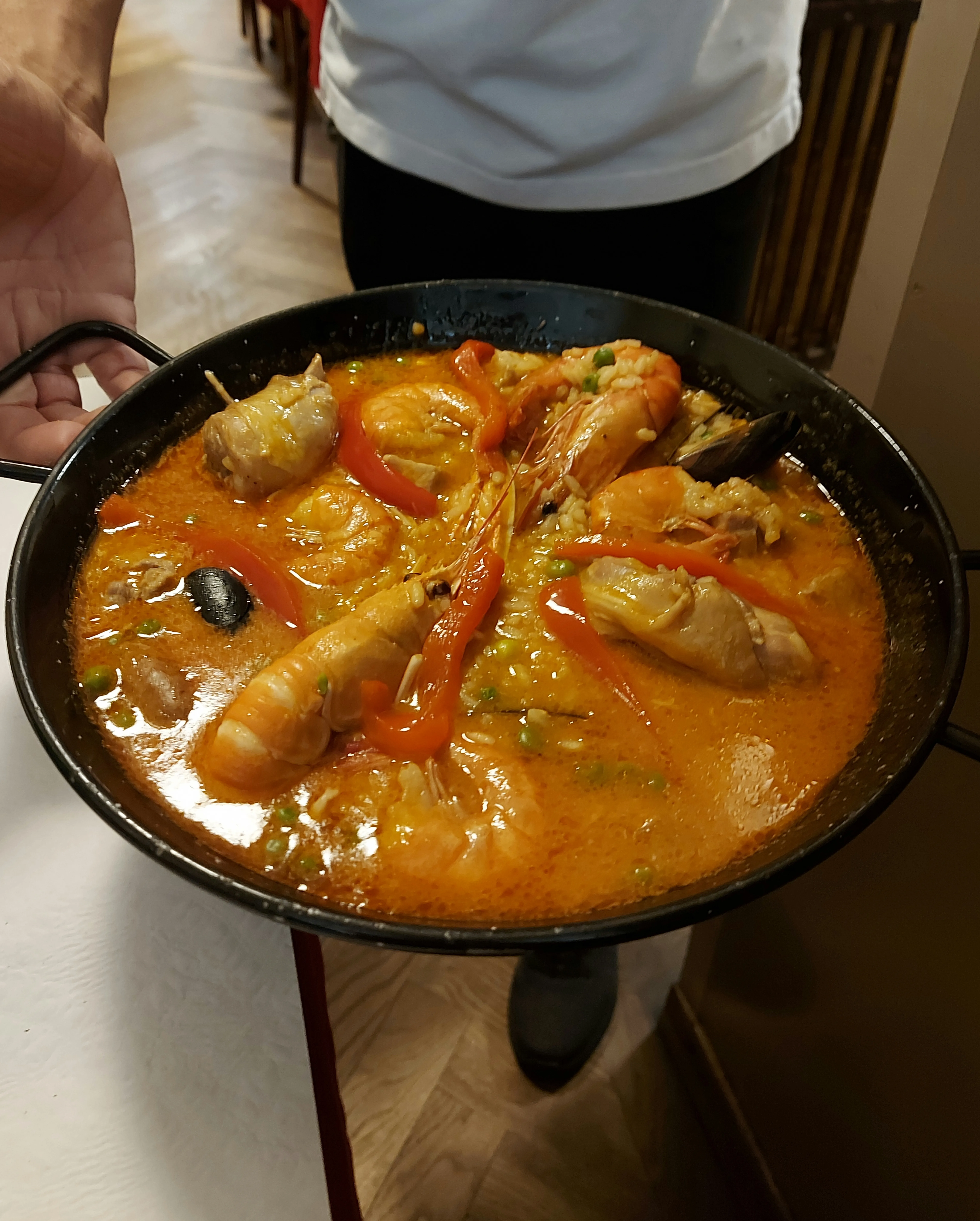 Paella in the cast-iron pan at Commerce Bern