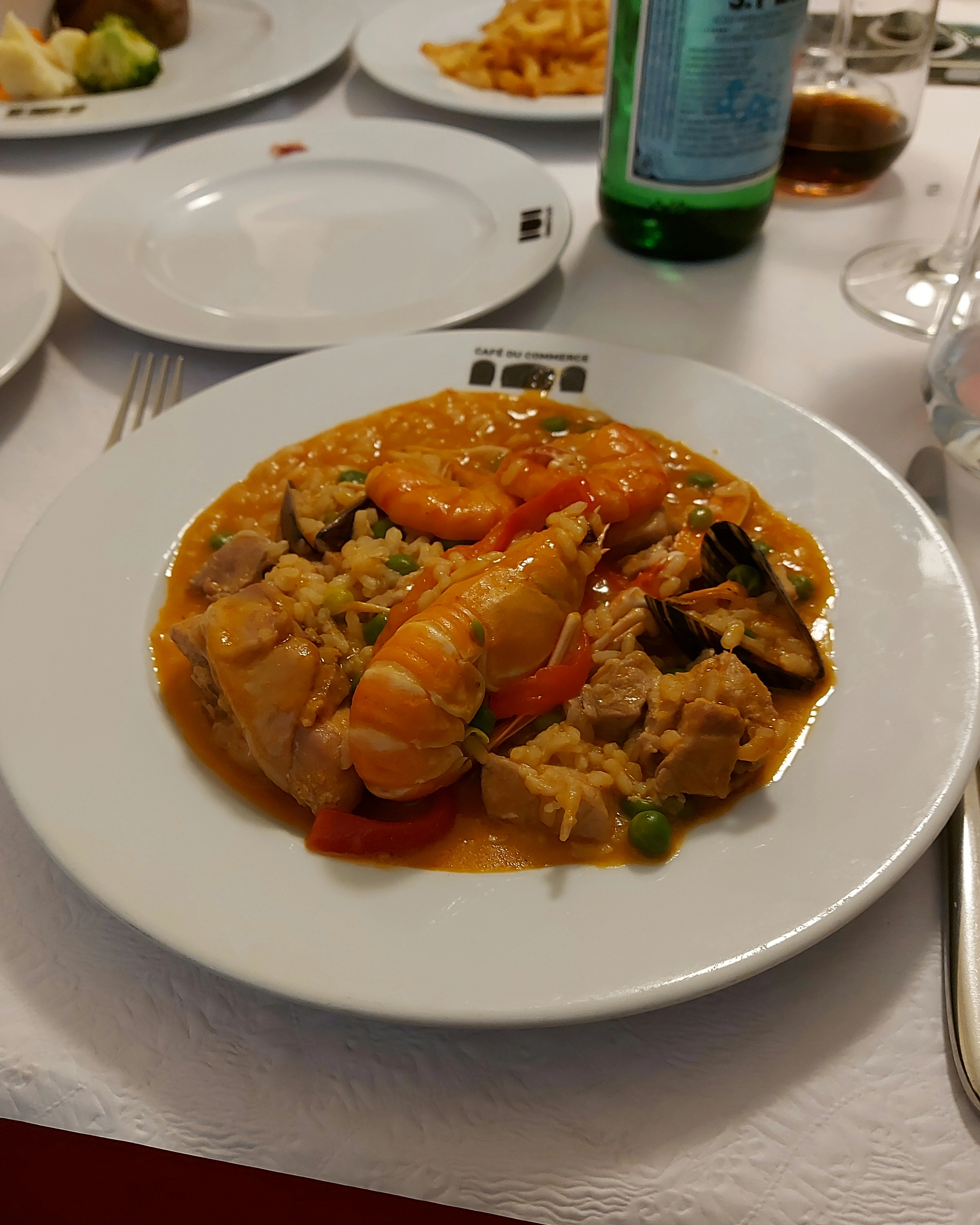 Paella on a plate at Commerce Bern