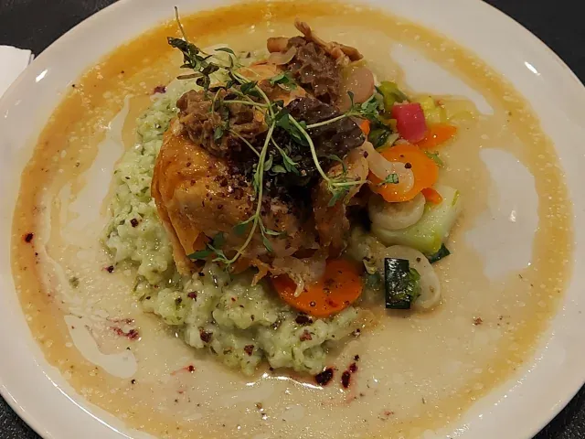 Chicken breast on wild garlic risotto with morel sauce at Fischerstübli Bern