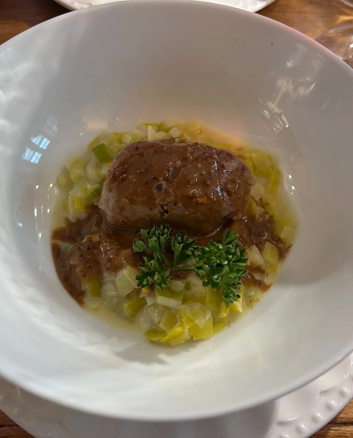 Adrio – pork sausage in caul fat at Harmonie Bern