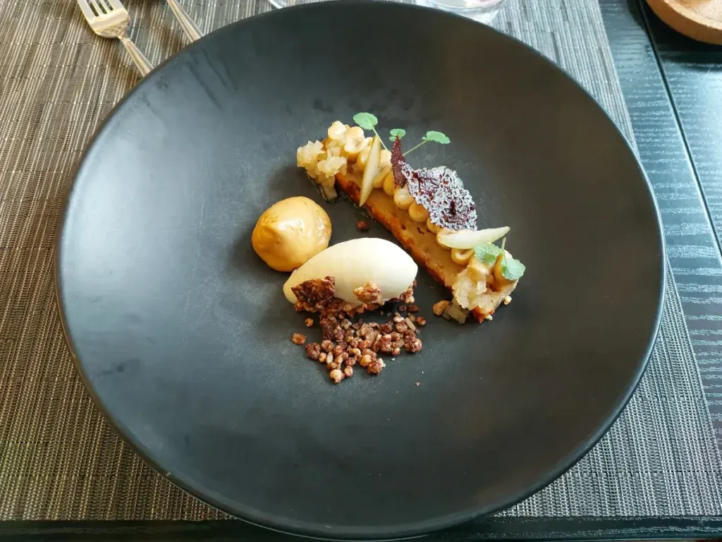 Pear sorbet with granola and cinnamon as dessert at Mille Sens Bern
