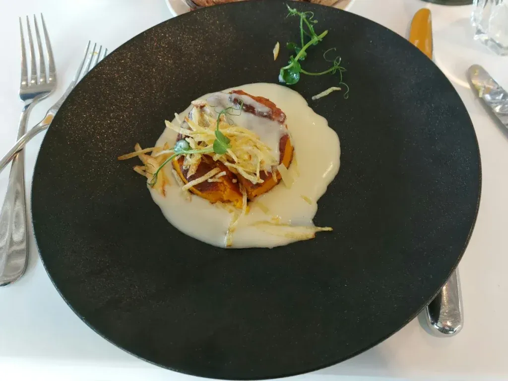 Pumpkin soufflé with goat cheese fondue at Nido Bern