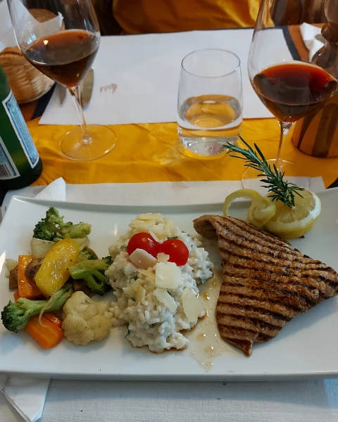 Veal paillard with risotto at Ristorante Toscana Bern